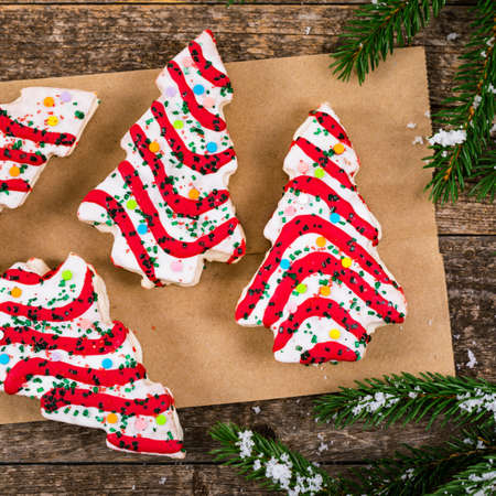 Christmas Tree Cakes on Wooden Background. Christmas Background. Selective focus.の写真素材