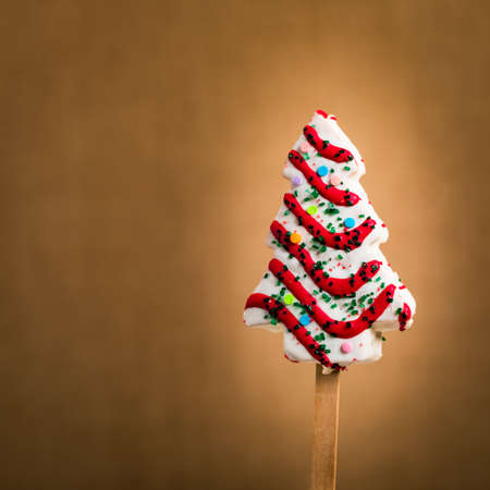 Christmas Background with Christmas Tree Cakes Pops on Stick. Selective focus.の写真素材