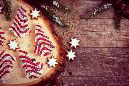 Christmas Tree Cakes on Wooden Background. Christmas Background. Selective focus.の写真素材