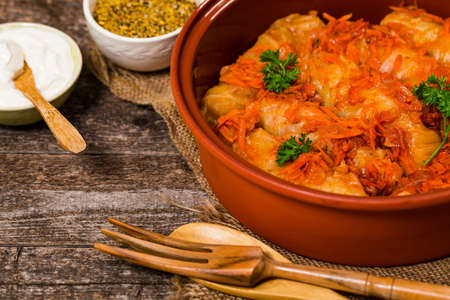 Russian Stuffed Cabbage Rolls on Wooden Background. Selective focus.の写真素材