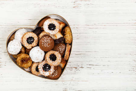 Valentines Day Card Background with Assorted Cookies over Wooden Background. Selective focus.の写真素材