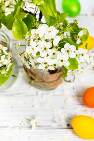 Spring Blossoms with Decorative Easter Eggs. Easter theme. Selective focus.の写真素材