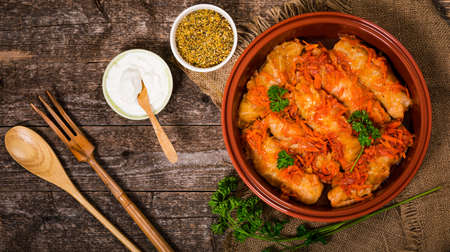 Stuffed Cabbage Rolls Top View on Vintage Wooden Background. Selective focus.の写真素材