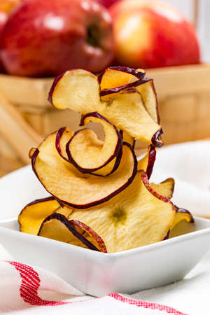 Baked Cinnamon Red Apple Chips. Selective focus.の写真素材