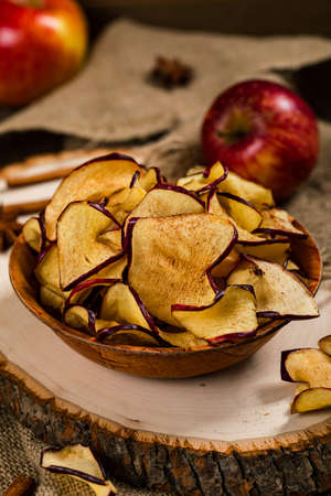 Baked Cinnamon Red Apple Chips. Selective focus.の写真素材