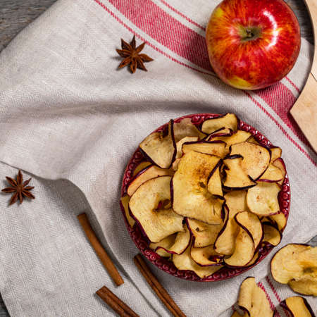 Baked Cinnamon Red Apple Chips. Selective focus.の写真素材