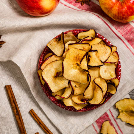 Baked Cinnamon Red Apple Chips. Selective focus.の写真素材