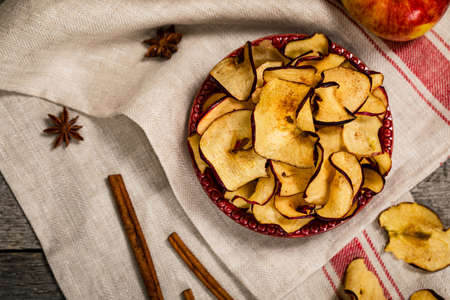 Baked Cinnamon Red Apple Chips. Selective focus.の写真素材
