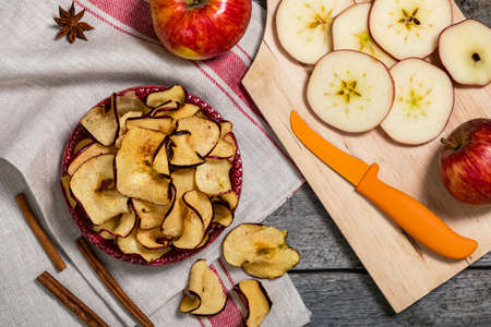 Baked Cinnamon Red Apple Chips. Selective focus.の写真素材