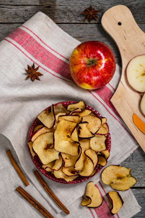 Baked Cinnamon Red Apple Chips. Selective focus.の写真素材