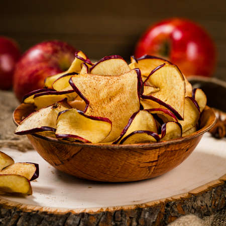 Baked Cinnamon Red Apple Chips. Selective focus.の写真素材
