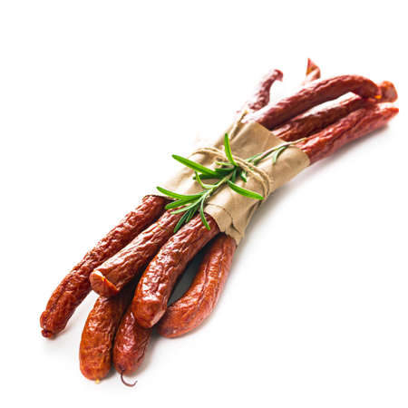 Kabanos or Cabanossi Thin Dry Smoked Polish Sausage Isolated on White background. Selective focus.の写真素材