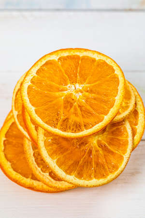 Dry Oranges Slices Snack. Dry Oranges for Christmas Decorations. Selective focus.の写真素材