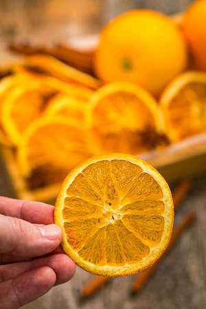Dry Oranges Slices Snack. Dry Oranges for Christmas Decorations. Selective focus.の写真素材