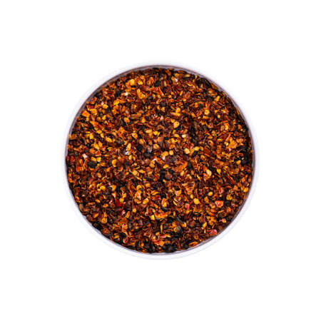 Fire Roasted or Sun Dried Tomatoes Spice Isolated on White Background. Macro with Selective focus.の写真素材