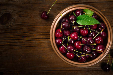 Cherries Background. Sweet Black and Red Cherries. Selective focus.の写真素材