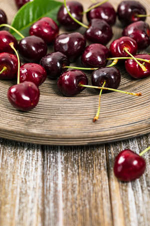 Cherries Background. Sweet Black and Red Cherries. Selective focus.の写真素材