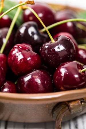 Cherries Background. Sweet Black and Red Cherries. Selective focus.の写真素材