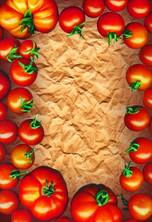 Clipping Path. tomatoes frame on brown recycling paperの写真素材