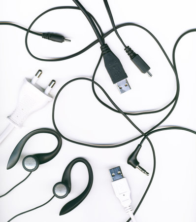 A collection of different electronic cabels on a white bacground, isolated 