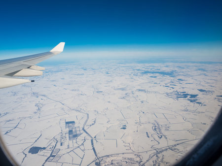 view of plane wing with the snow Russia
