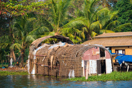 Old wattled houseboat on Kerala backwaters. Kerala, Indiaの写真素材