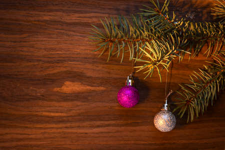 New Year Card Design with branch of a fir-tree and christmas ballsの写真素材