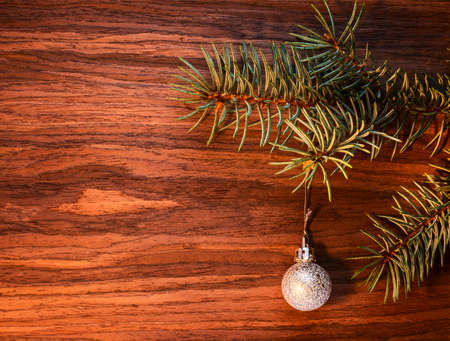 New Year Card Design with branch of a blue spruce and christmas ballsの写真素材