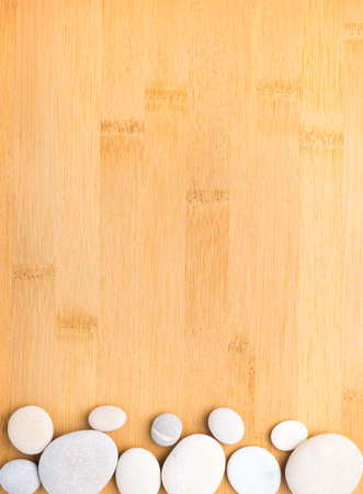 pebbles  frame on bamboo  backgroundの写真素材