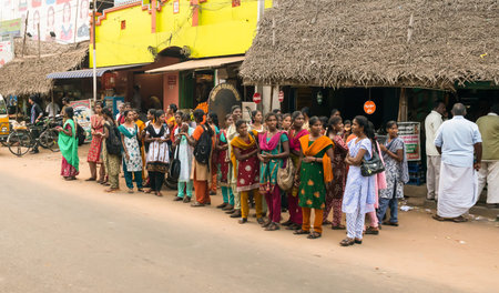 THANJAVOUR, INDIA - FEBRUARY 13: An unidentified Women in traditional dress standing at the roadside. India, Tamil Nadu, near Thanjavour. February 13, 2013のeditorial素材