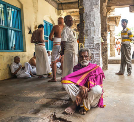 THANJAVOUR, INDIA - FEBRUARY 14: An unidentified Indian men are in the Brihadeeswarar Hindu Temple. India, Tamil Nadu, Thanjavour. February 14, 2013のeditorial素材
