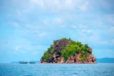 beautiful blue sea and clouds on sky with boats and islandの写真素材