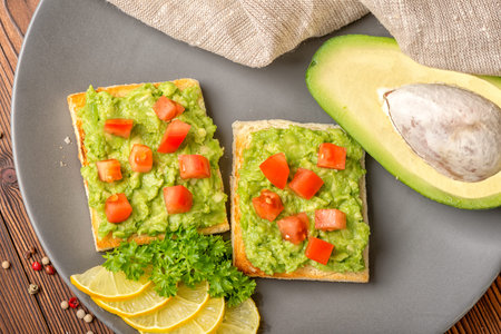 top view of sandwiches with latin american mexican sauce guacamole with avocado and white bread...