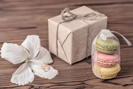 paper box, colorful macarons cake tied  ribbon, hibiscus flower and empty blank,  Valentines day conceptの写真素材