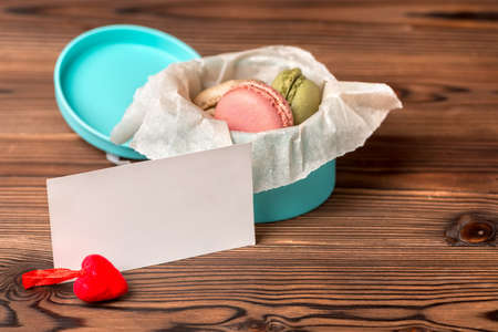 macarons cake in gift box, red heart and empty blank, St. Valentines day conceptの写真素材