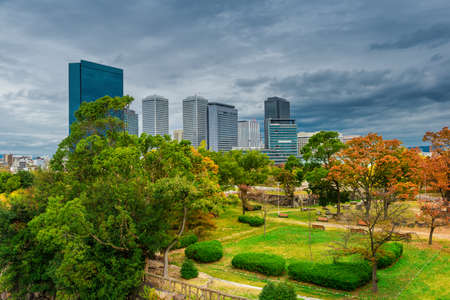 Beautiful landscape of Osaka city with modern buildings and parkの写真素材