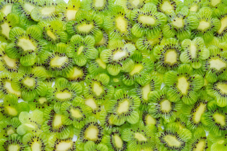 funny creative concept of sliced kiwi flower shape like background