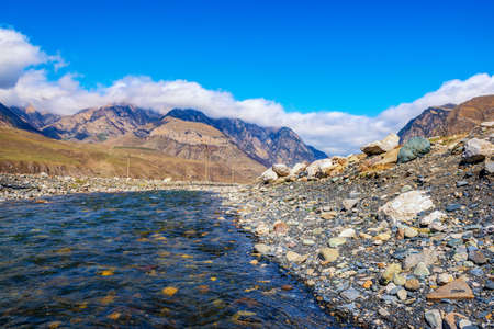 beautiful landscape of fast mountain river in mountains of Caucasusの写真素材