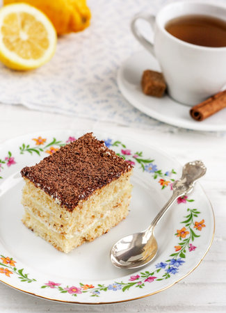 lemon cake and tea on a beautiful plate