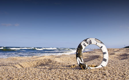 vinatge and cracked clock dial and sea landscape
