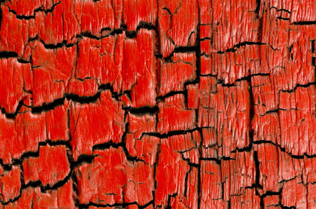 burnt and painted wood red background and texture