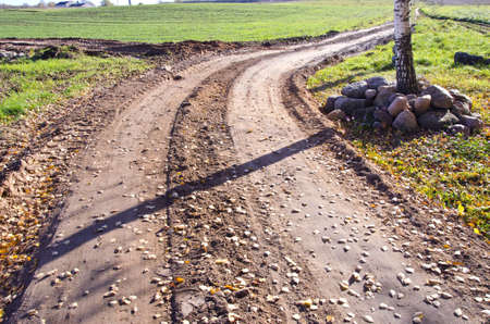 autumn road in the villageの写真素材