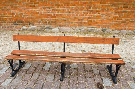 wooden bench in the old town street