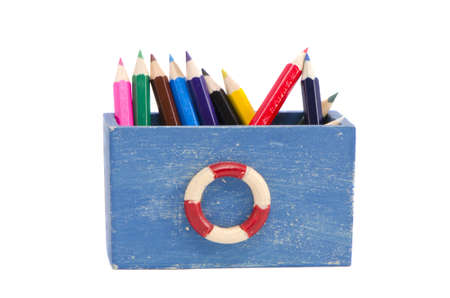 isolated on white colorful pencils in the retro wooden boxの写真素材