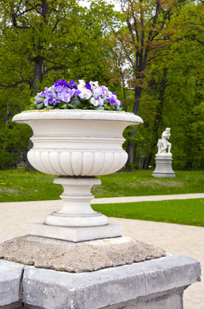 outdoor vase with flowers in the old manor parkの写真素材