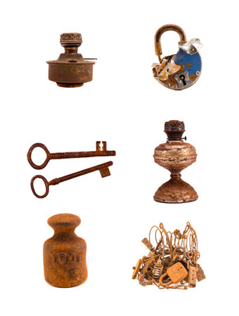 assorted rusty metal  objects and tools isolated on white