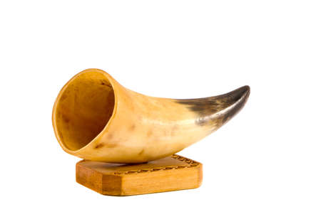 handmade cow horn vase isolated on white backgroundの写真素材