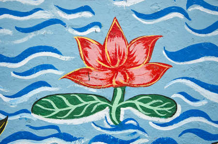 graffiti with lotus fragment on wall in Indiaの写真素材