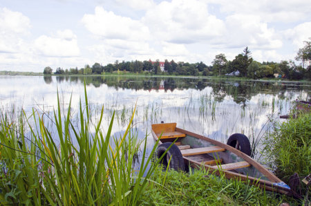 beautiful summer lake and one boat