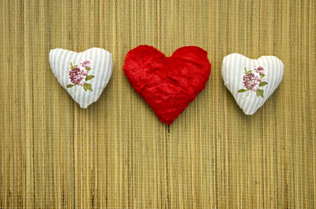 three beautiful clothes hearts - romance love symbolsの写真素材